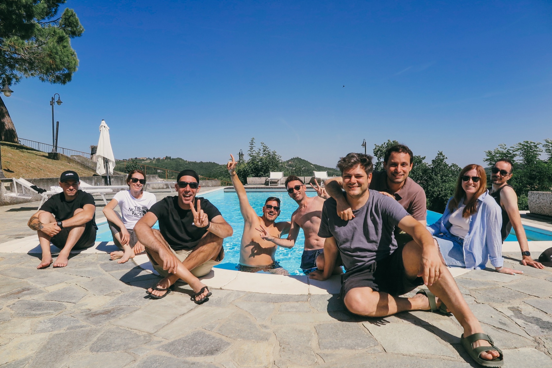 Group photo by the pool