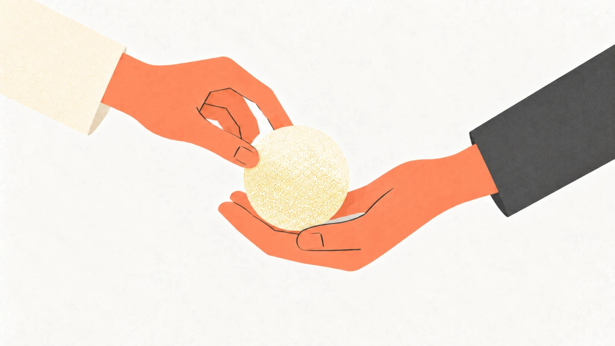 Una mano passa a un’altra una sfera dalla superficie lavorata.